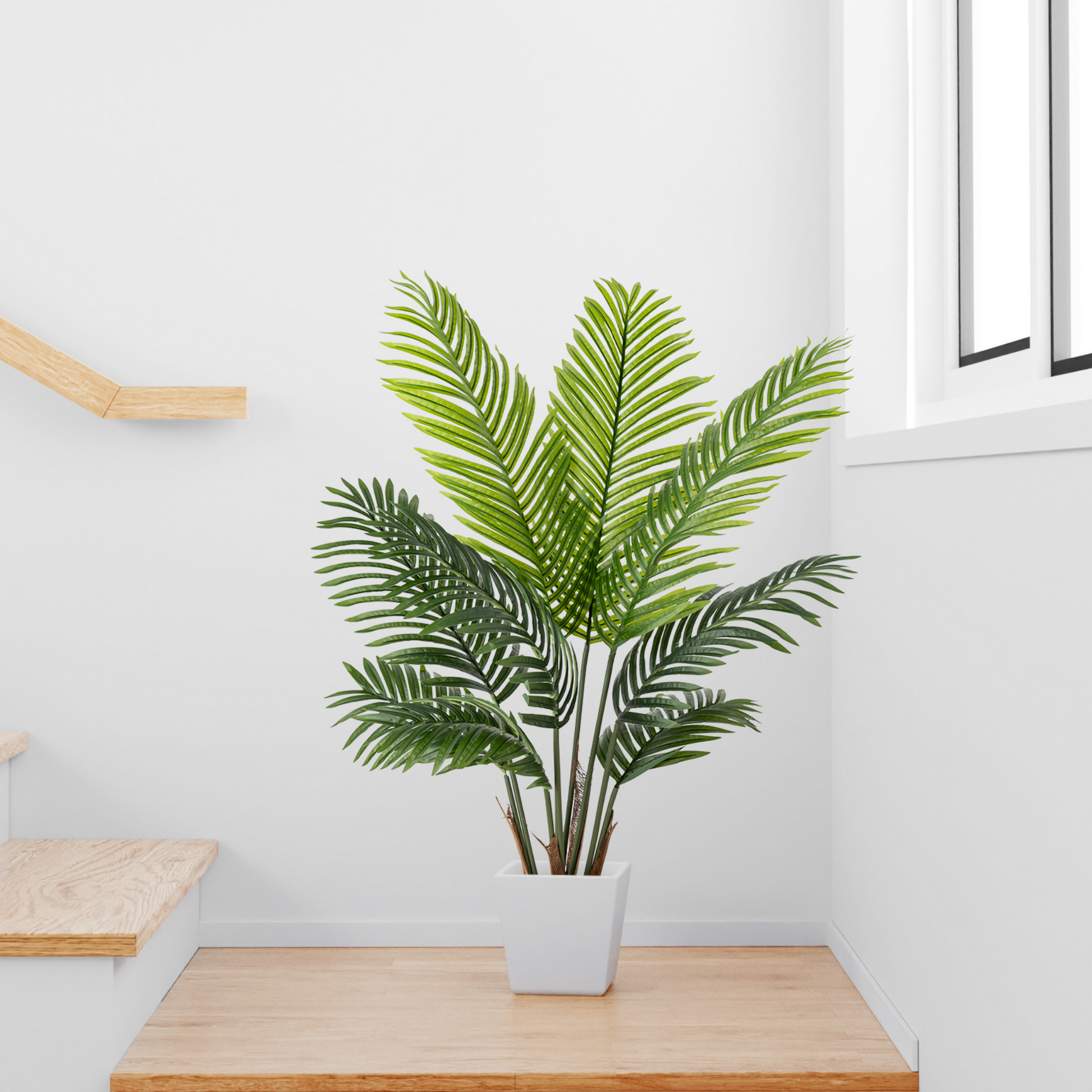Detailaufnahme der realistischen, gefiederten Blätter der Areca Kunstpalme in sattem Grün