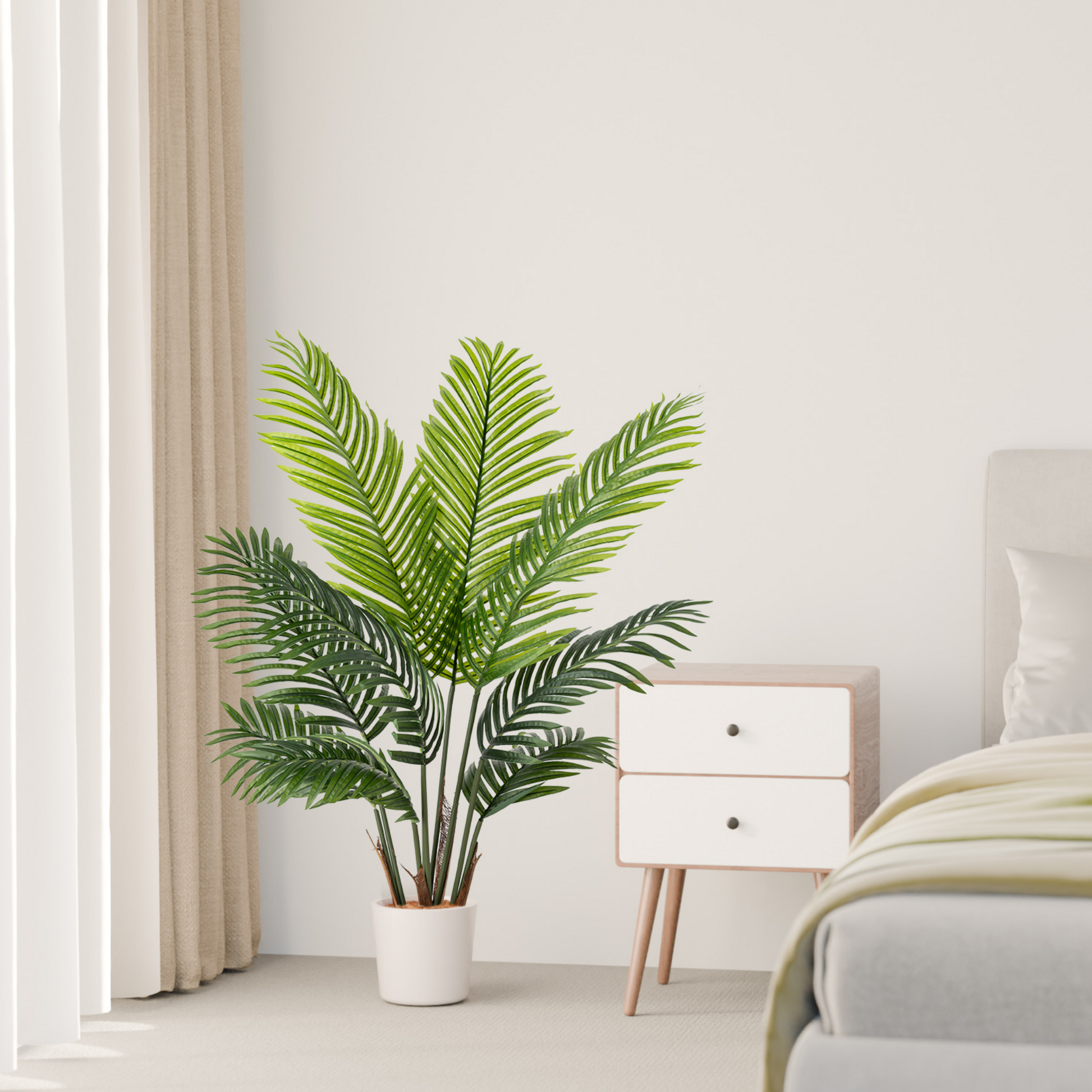 Detailaufnahme der realistischen, gefiederten Blätter der Areca Kunstpalme in sattem Grün