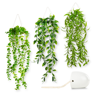 Hängende Kunstpflanzen in eleganten weißen Keramik-Wandvasen, Eukalyptus Mix