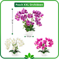 Lila Orchidee künstlich mit naturgetreuen Blättern auf Tisch