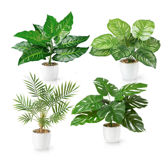 Tropische Kunstpflanzen Mix mit Areca- und Monstera-Blättern in weißen Keramiktöpfen