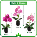 Orchideen-Arrangement auf Fensterbank in hellem Raum, künstliche Blumen